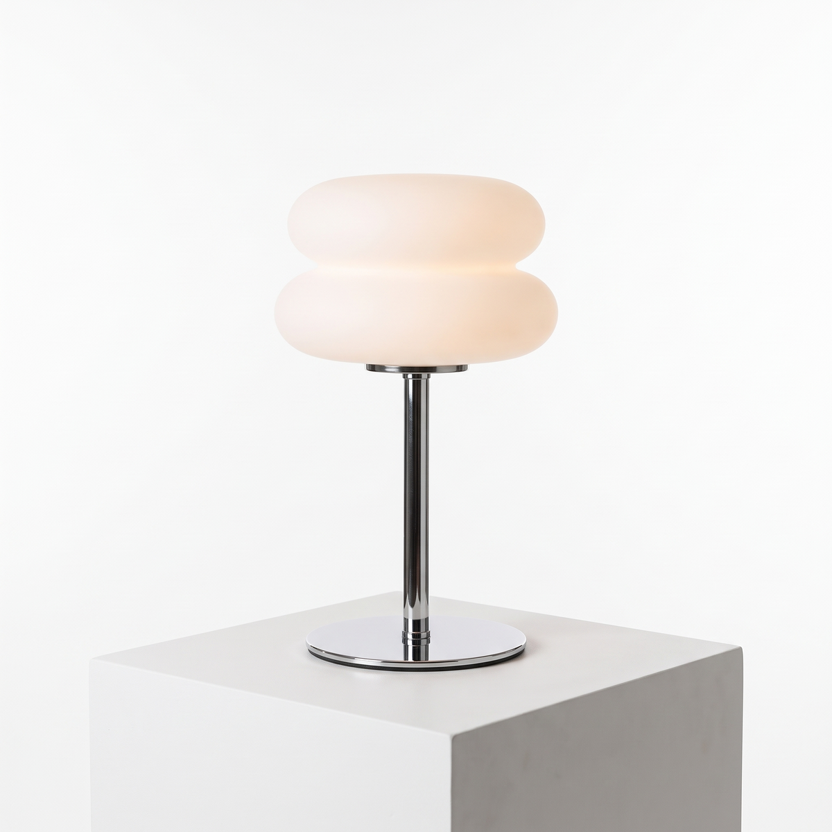 Bauhaus Macaron Table Lamp in White on a white display plinth