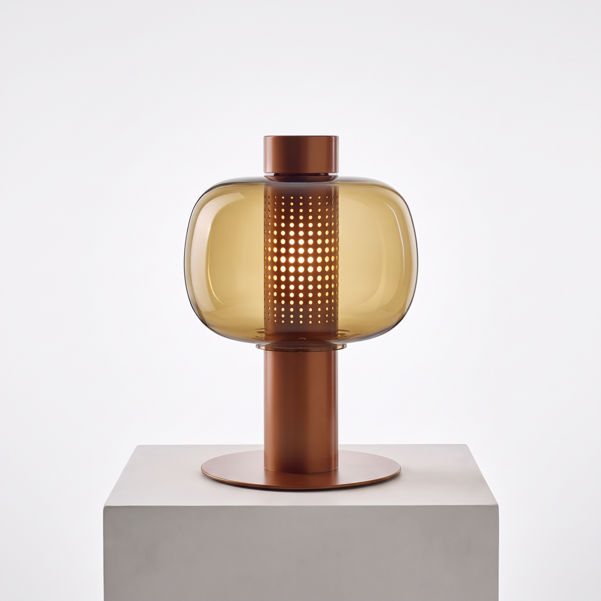 Mid-Century Bedside Table Lamp in Type D, amber glass with copper base on a white display plinth