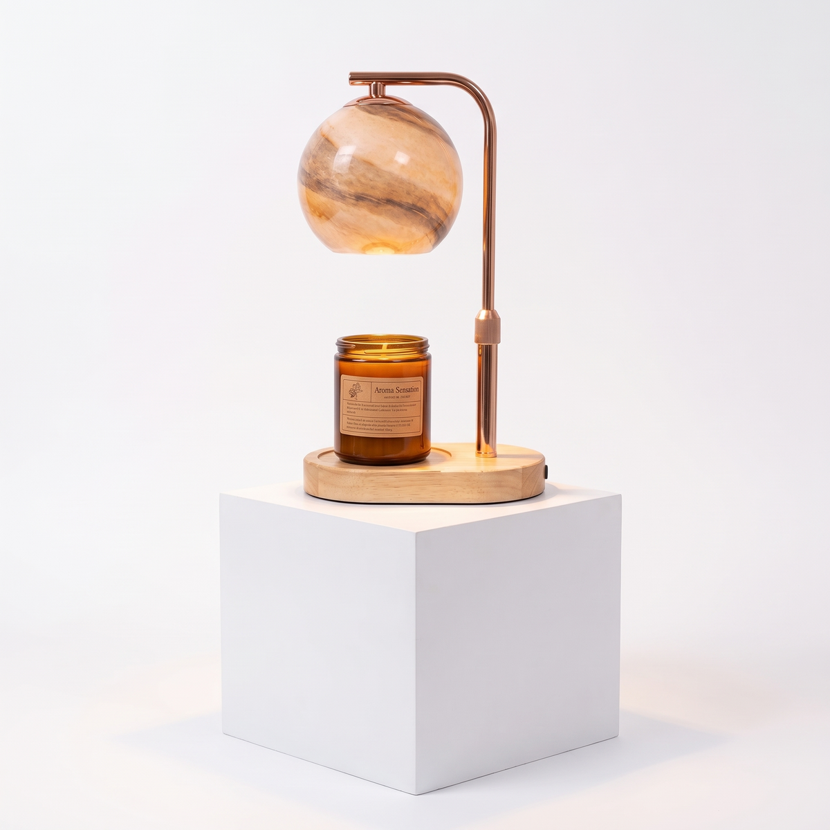 Glass Sphere Candle Warmer Lamp on a white display plinth, full view