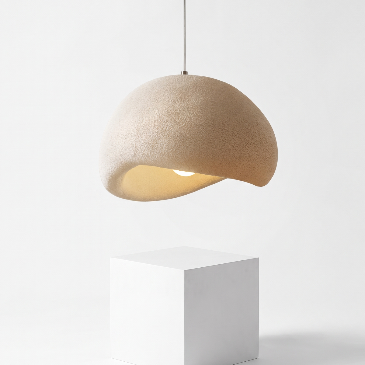 Wabi-Sabi Japanese Pendant Light on a white display plinth, detail view