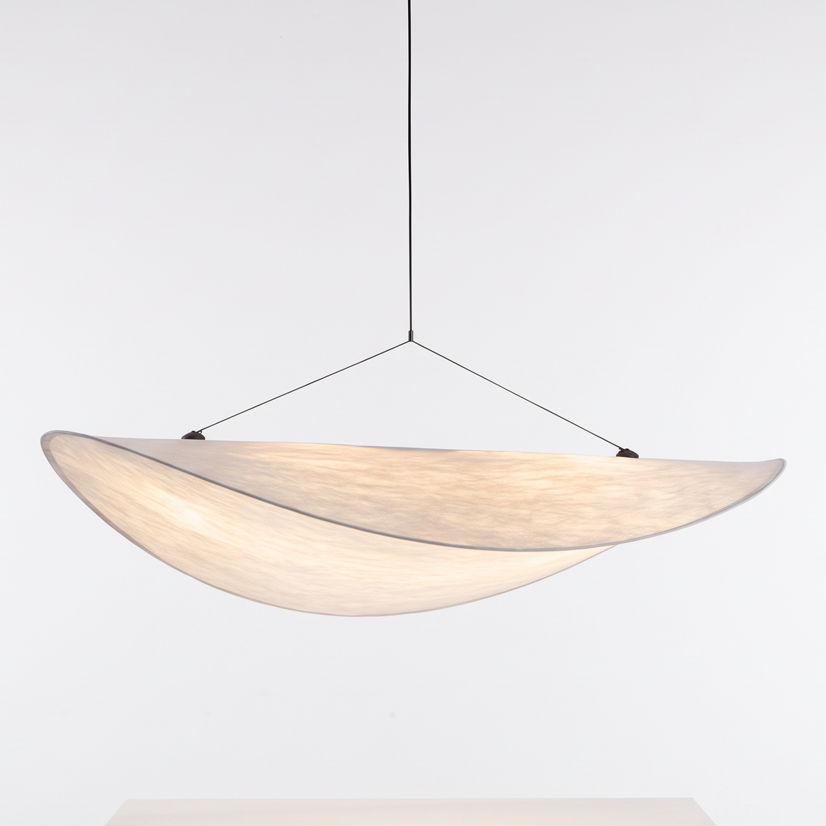 Nordic Silk Pendant Chandelier on a white display plinth, close up detail