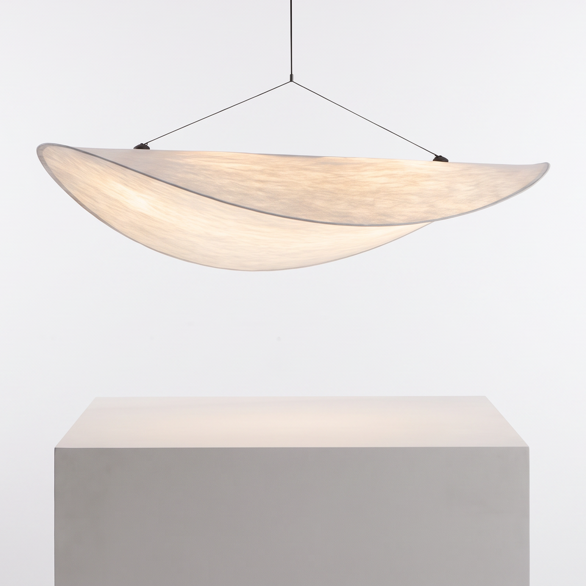 Nordic Silk Pendant Chandelier on a white display plinth, detail view