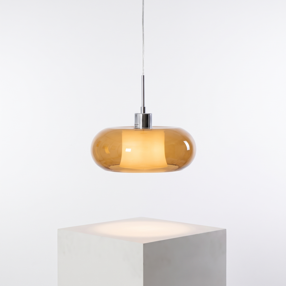 Bauhaus Retro Glass Pendant Light in Vintage milk tea shade on a white display plinth