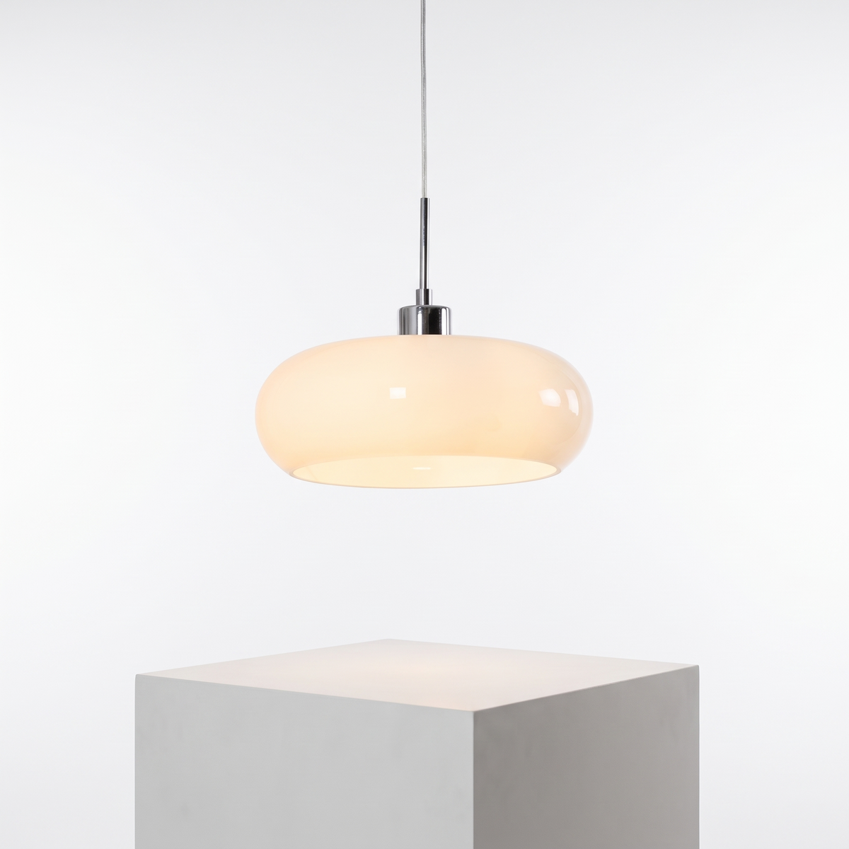 Bauhaus Retro Glass Pendant Light in White shade on a white display plinth