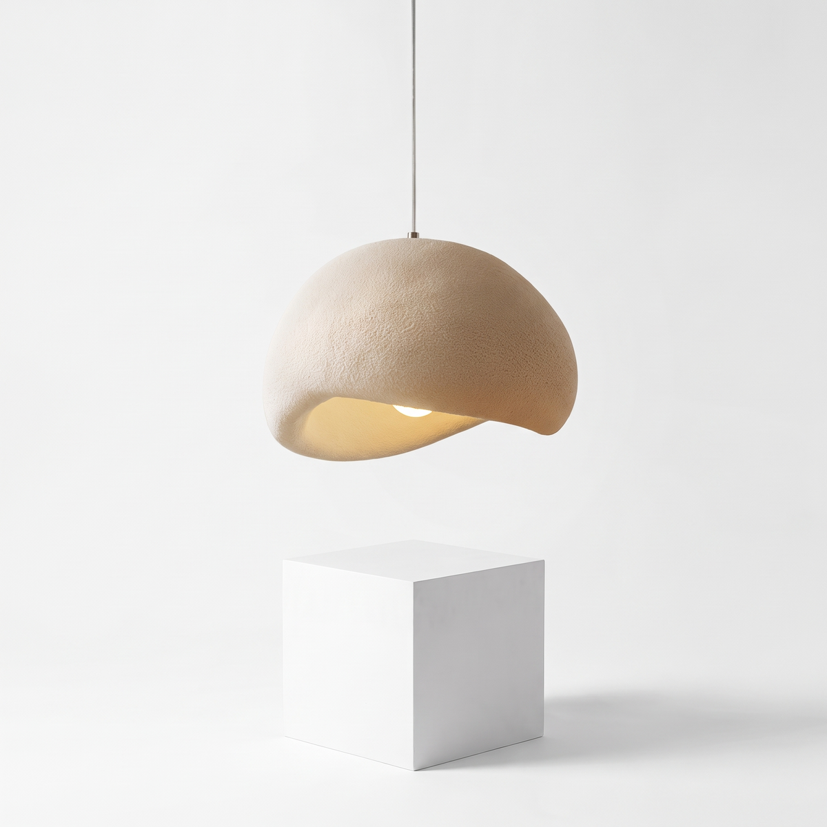 Wabi-Sabi Japanese Pendant Light on a white display plinth, full view