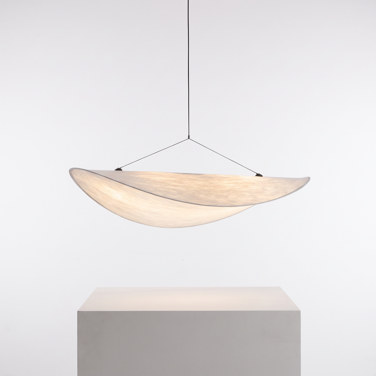 Nordic Silk Pendant Chandelier on a white display plinth, full view